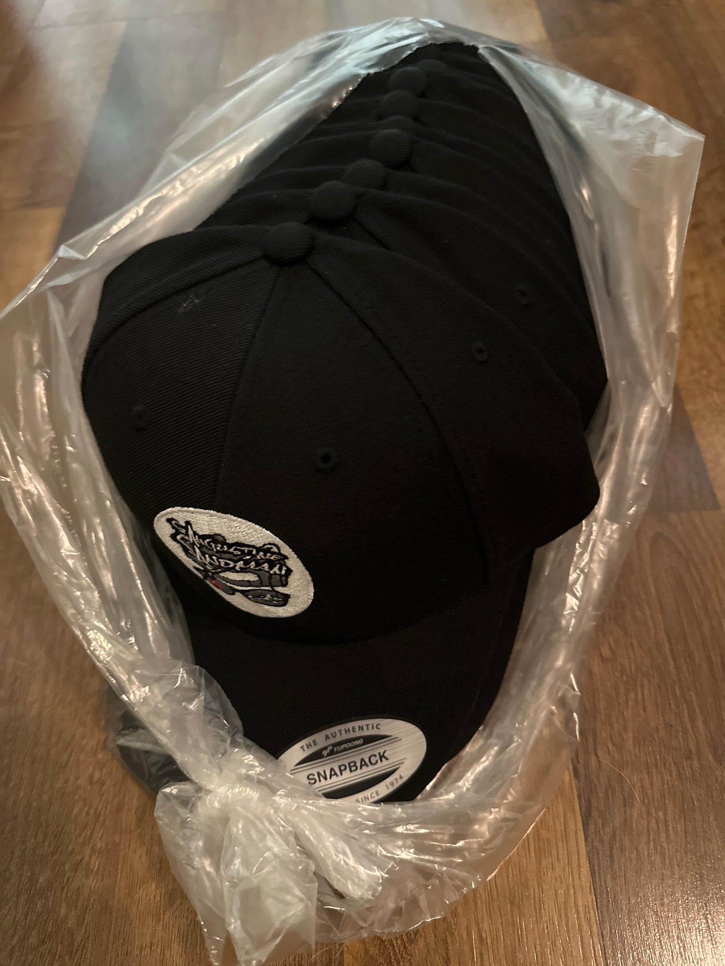 Black Snap back hat with embroidered logo Patch
